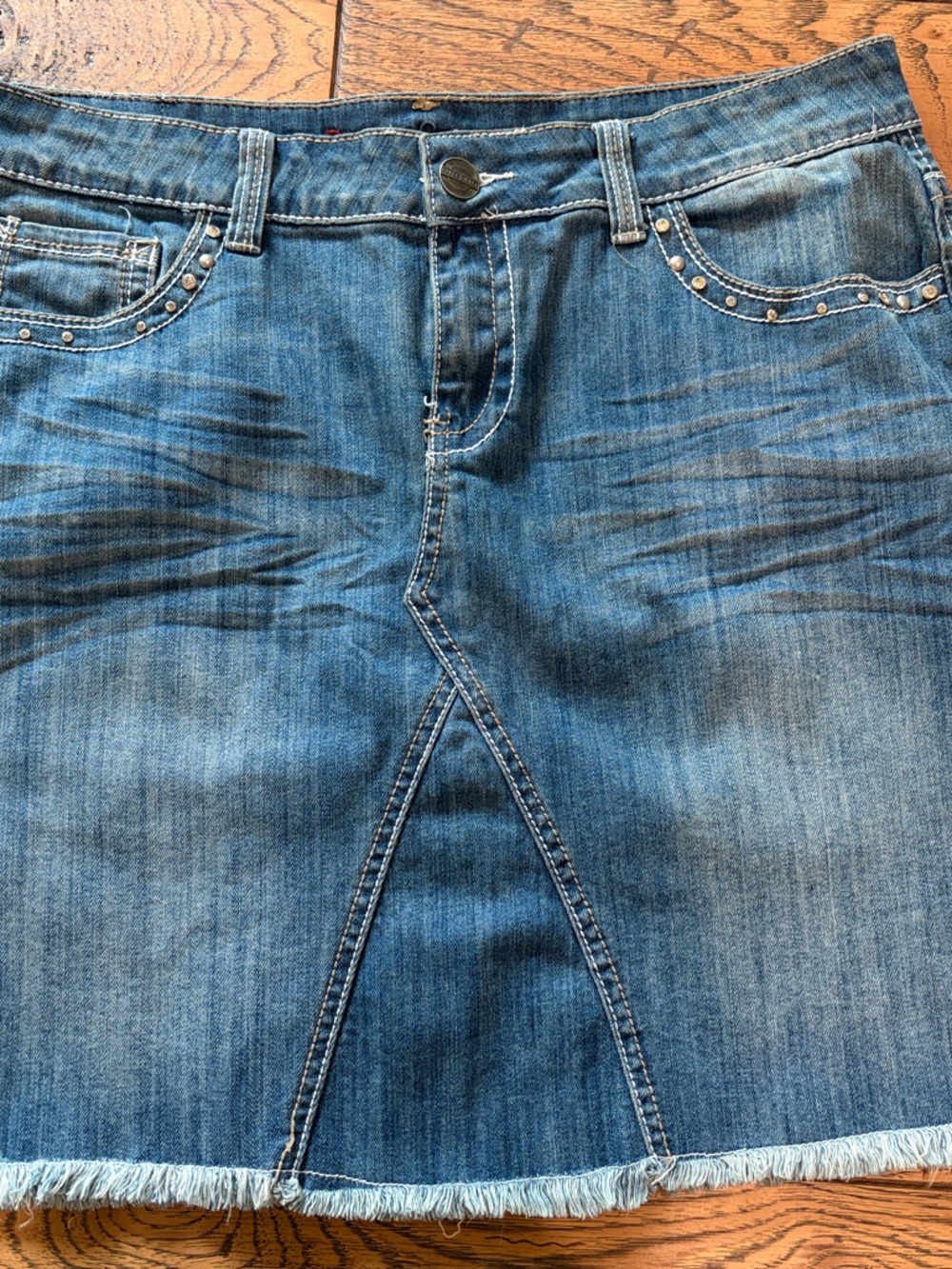 Baker Street Distressed Blue Denim Mini Skirt with Studded Pockets